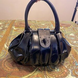 Alexander McQueen Elvie Bag. Black patent leather. Hardly used.